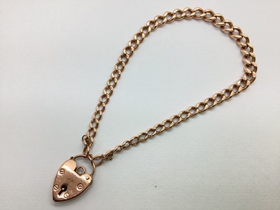 Lot 229 - A Graduated Curb Link Bracelet, (rose colour...