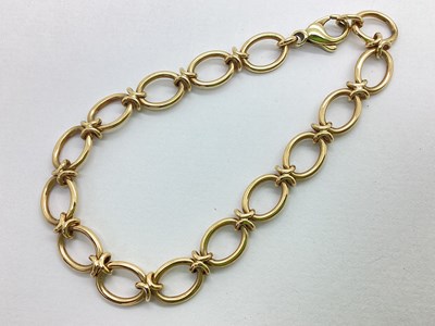 Lot 228 - A Modern 9ct Gold Bracelet, of uniform design...