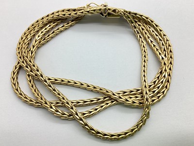 Lot 227 - A UNOAERRE Four Row Bracelet, of uniform...