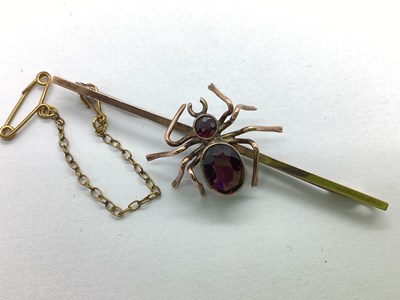 Lot 196 - An Antique Novelty Garnet Set Spider Bar...