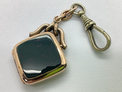 Lot 301 - A Bloodstone and Onyx Inset Square Locket...