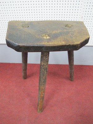 Lot 1535 - A XIX Century Elm Cutlers Stool, 57cm high.