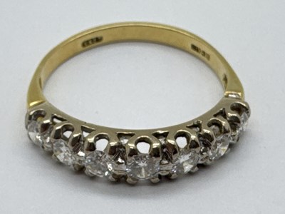 Lot 272 - An 18ct Gold Seven Stone Diamond Ring, the...