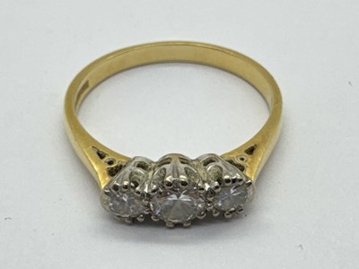Lot 273 - An 18ct Gold Three Stone Diamond Ring, the...