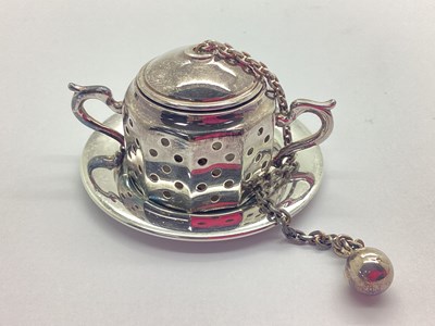 Lot 119 - Tiffany & Co; A Novelty Tea Infuser, stamped...