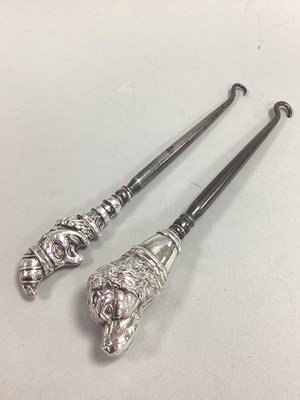Lot 128 - A Novelty Hallmarked Silver Handled Button...