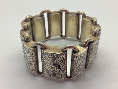 Lot 239 - A Victorian Wide Hollow Link Panel Bracelet,...