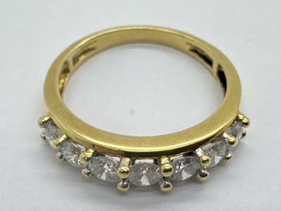 Lot 268 - A Modern 18ct Gold Seven Stone Diamond Ring,...