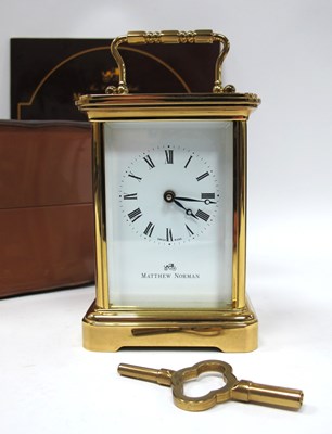 Lot 1466 - A Matthew Norman Brass Carriage Clock, within...