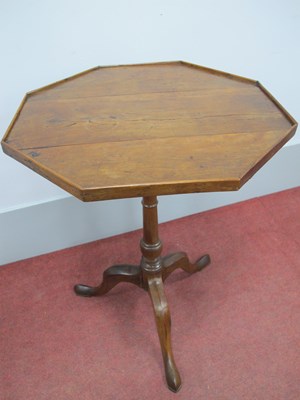 Lot 1575 - A Yew Wood Pedestal Table, with octagonal top,...