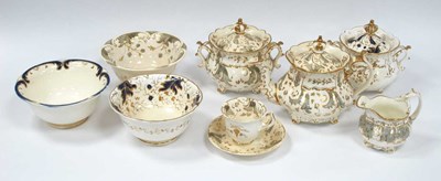Lot 1115 - A Rockingham Porcelain Teapot and Cover, with...