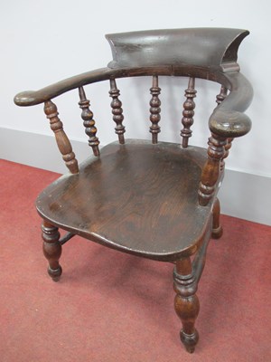 Lot 1570 - A XIX Century Elm Captian's Chair, with curved...