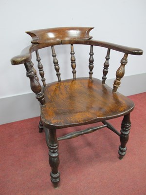 Lot 1571 - A XIX Century Elm Captian's Chair, with curved...