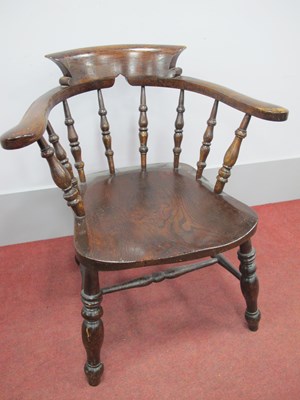 Lot 1566 - A XIX Century Elm Captian's Chair, with curved...
