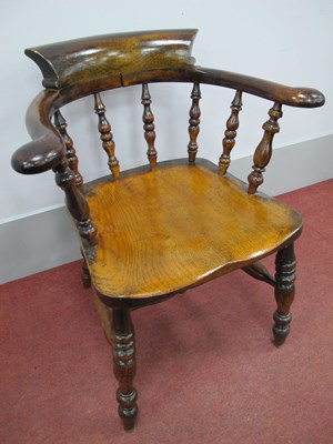 Lot 1567 - A XIX Century Elm Captian's Chair, with curved...