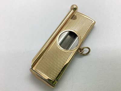 Lot 298 - A 9ct Gold Cased Cigar Cutter, of rectuangular...