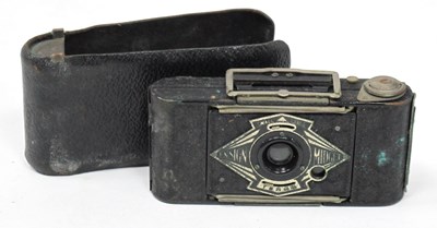 Lot 1303 - An Ensign Midget Camera, with leather cover,...
