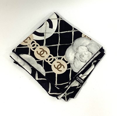 Lot 1408 - Chanel; A Silk Square Scarf, in a stylised...
