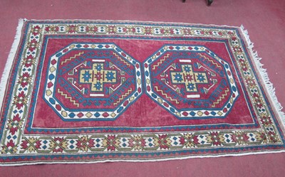 Lot 1475 - A Middle Eastern Rug, with two central...
