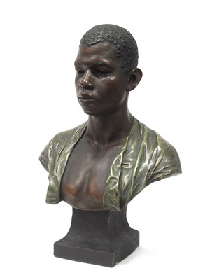 Lot 1122 - A Goldscheider Pottery Bust of a Nubian Boy,...
