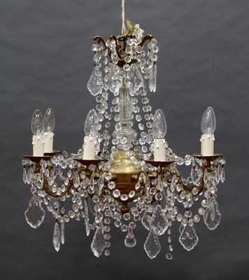 Lot 1395 - A XX Century Eight Branch Gilt Metal...