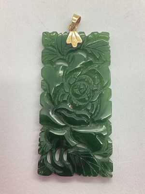 Lot 89 - A Carved Green Hardstone Panel Pendant, of...