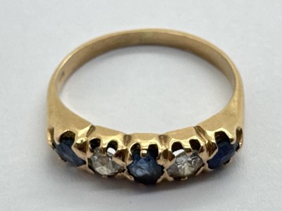 Lot 38 - A 9ct Gold Sapphire and Diamond Five Stone...
