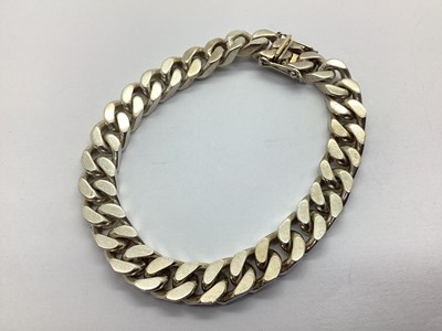 Lot 100 - A Hallmarked Silver Chunky Curb Link Bracelet,...