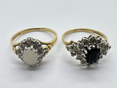 Lot 27 - A Modern 9ct Gold Cluster Dress Ring, oval...