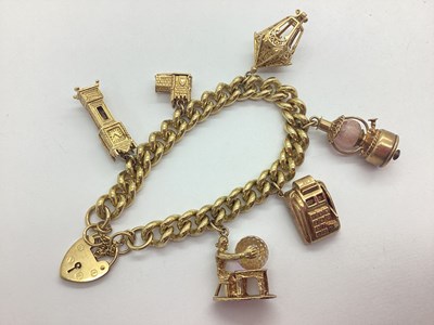 Lot 64 - A 9ct Solid Gold Curb Link Charm Bracelet, to...