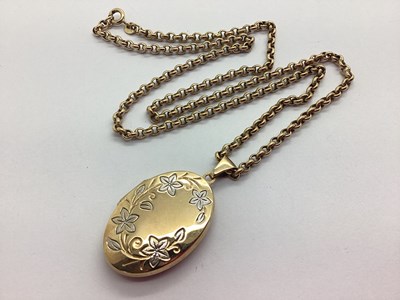 Lot 82 - A Modern 9ct Gold Oval Locket Pendant, two...