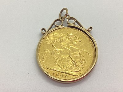 Lot 71 - A 1892 Victoria Sovereign, loose set within...