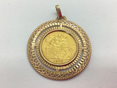 Lot 67 - A 1932 George V Sovereign, (SA), loose set...