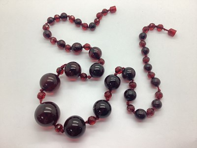 Lot 181 - A Cherry Amber Colour Long Single Strand...