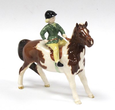 Lot 1209 - A Beswick Pottery Girl in Green Jacket and...