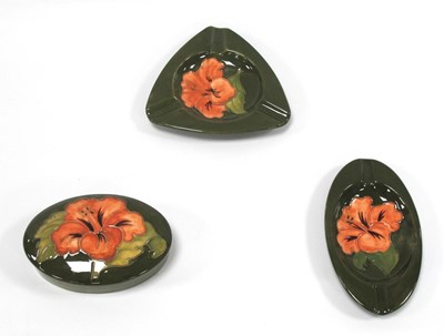 Lot 1211 - Moorcroft 'Pink Hibiscus' Oval Ashtray and...