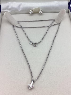 Lot 65 - A Modern 9ct White Gold Pendant and Chain,...