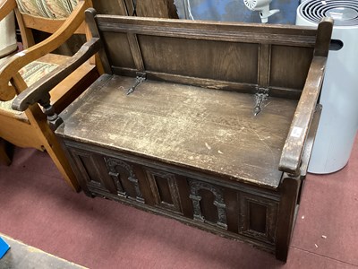 Lot 1539 - XX Century Oak Settle, with a low back, hinged...