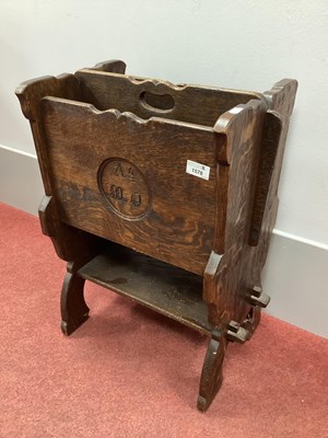 Lot 1540 - XX Century Oak Magazine Stand, with a carrying...