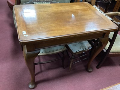 Lot 1551 - XX Century Mahogany Fold Over Table, on...