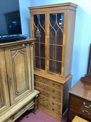 Lot 1567 - Yew Wood Bookcase, the top with twin glazed...