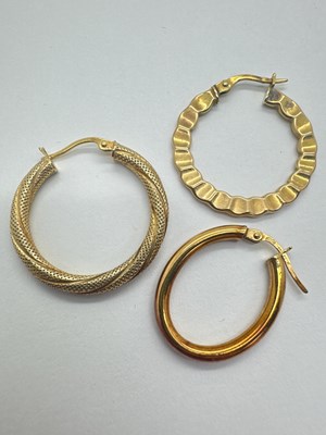 Lot 57 - Three Odd/Single Creole Hoop Earrings, each...