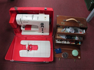 Lot 1438 - Bernina Sewing Machine, cottons etc in walnut...