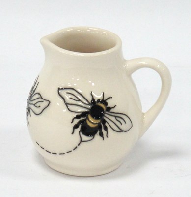 Lot 1296 - A Moorcroft Pottery Jug, painted in the 'Bee...