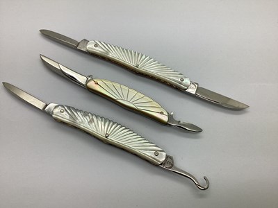 Lot 391 - Two Decorative Folding Penknives, brass lined...