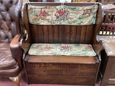 Lot 1572 - XX Century Oak Box Settle, with shaped sides,...