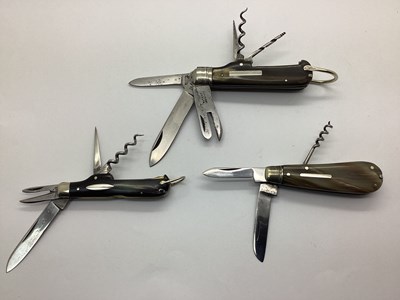 Lot 1311 - Three Multi Tool Folding Penknives, including...
