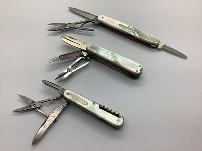 Lot 387 - Three Multi Tool Folding Pocket Knives, mother...