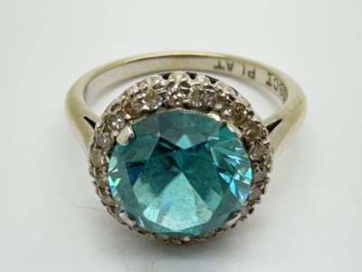 Lot 70 - A Modern Cluster Style Ring, the circular four...