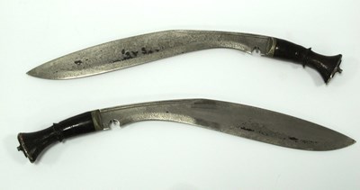Lot 1308 - Two Kukri Knives, discolouration to blades and...